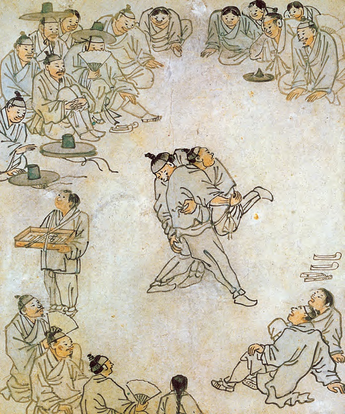 <b>Ssireum (Lucha tradicional de Corea) por Kim Hong-do, (Nombre artístico: Danwon 1745-1806) (Joseon, s. XVIII).</b> Esta pintura de género fue pintada por Kim Hong-do, uno de los pintores más prodigiosos de finales del período de Joseon. En esta obra el pintor captura la imagen vívida y expresiones de los espectadores absortos y los luchadores.