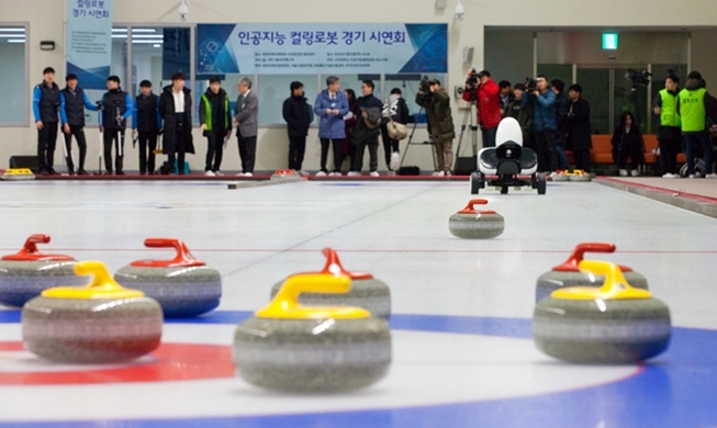 Robots compiten contra humanos en un partido de curling